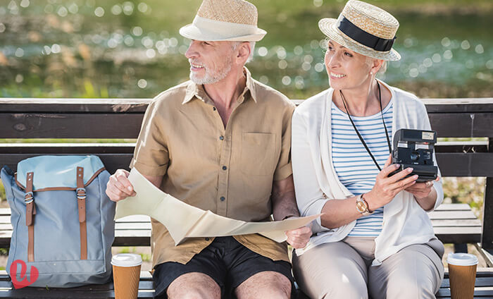 old couple travel guides